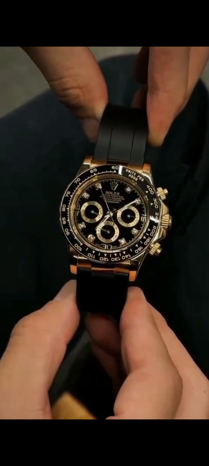 Rolex Daytona Copy Watch Designed for Man  Luxury Rolex Daytona gold-tone copy watch featuring black dial with diamond markers, chronograph function, and durable rubber strap