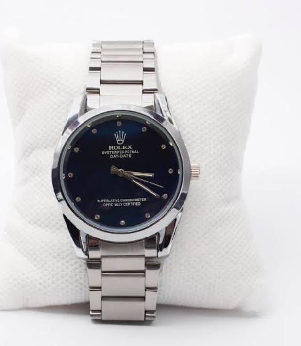 Rolex Oyster Perpetual men's watch featuring a blue & White dial with  Silver stainless steel chain
